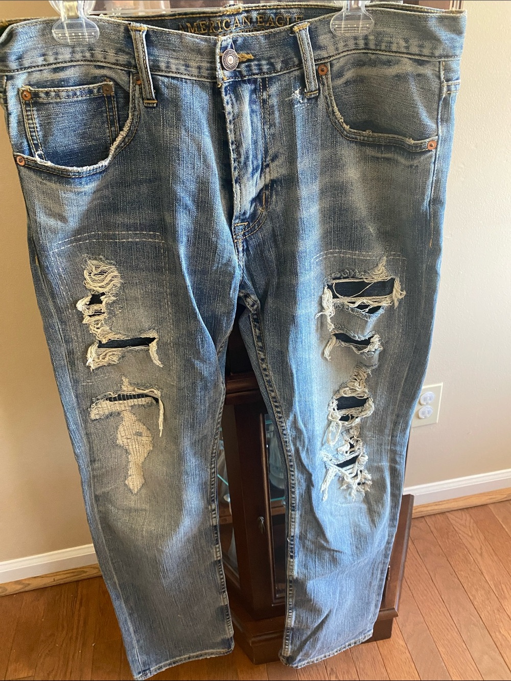 #15. American Eagle Outfitters Ripped Light Blue Men’s Slim Straight Jeans #15